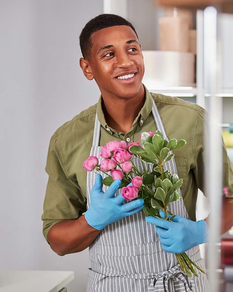 cheerful-young-man-during-working-day-in-flower-sh-5K2QYR2-pfgul2zrb9wojlfkec162dgken0sm8cb6r9ks6fevk